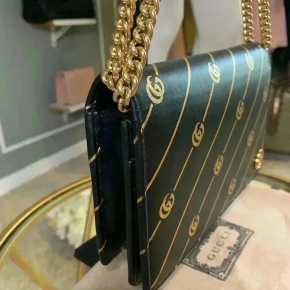 Gucci mini leather chain bag with double G stripe in black and gold. - Picture 5 of 14